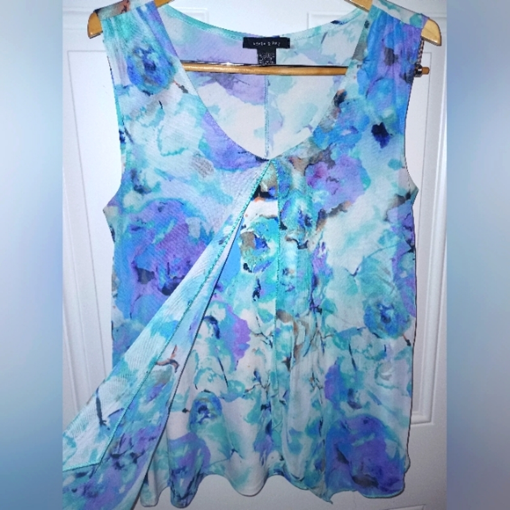 Women's  Floral Sleeveless Top. Made By Adele And May. 95% Polyester, 5% Spandex